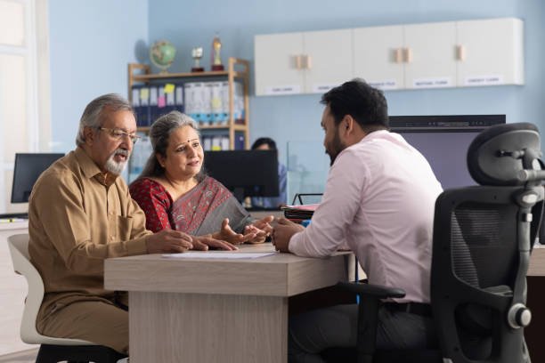 senior couple meeting with financial advisor
