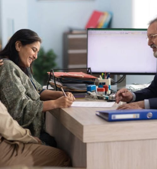 senior couple meeting with financial advisor