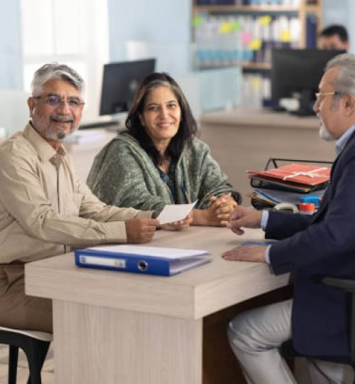 senior couple meeting with financial advisor